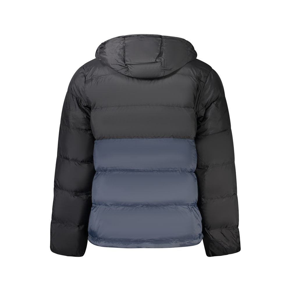 Hooded Windbreaker Jacket by Calvin Klein for men in polyamide black, blue & print showcases a modern silhouette, integrating pockets, hooded & windproof and a modern for a sophisticated finish.