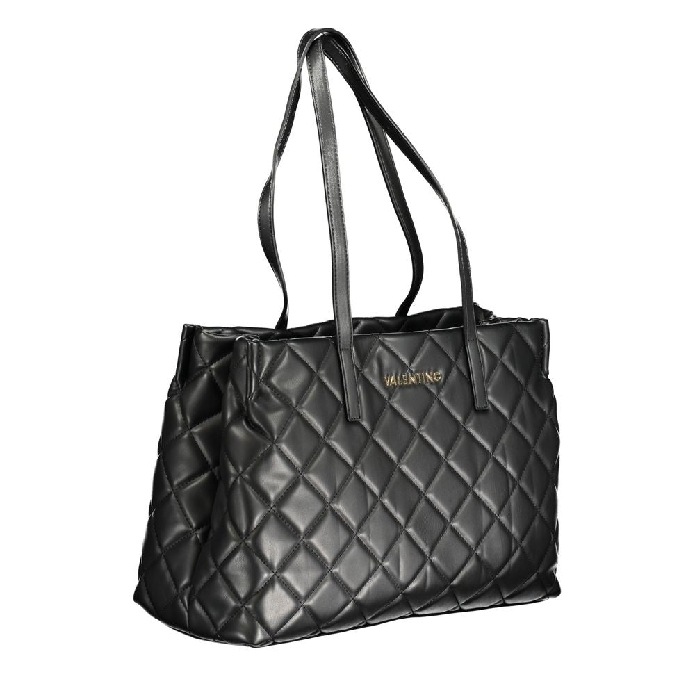 This Handbag by Mario Valentino for women in polyethylene and black presents a sculptural silhouette featuring a secure zipper, ample internal-pockets, and versatile handle for a sculptural finish.