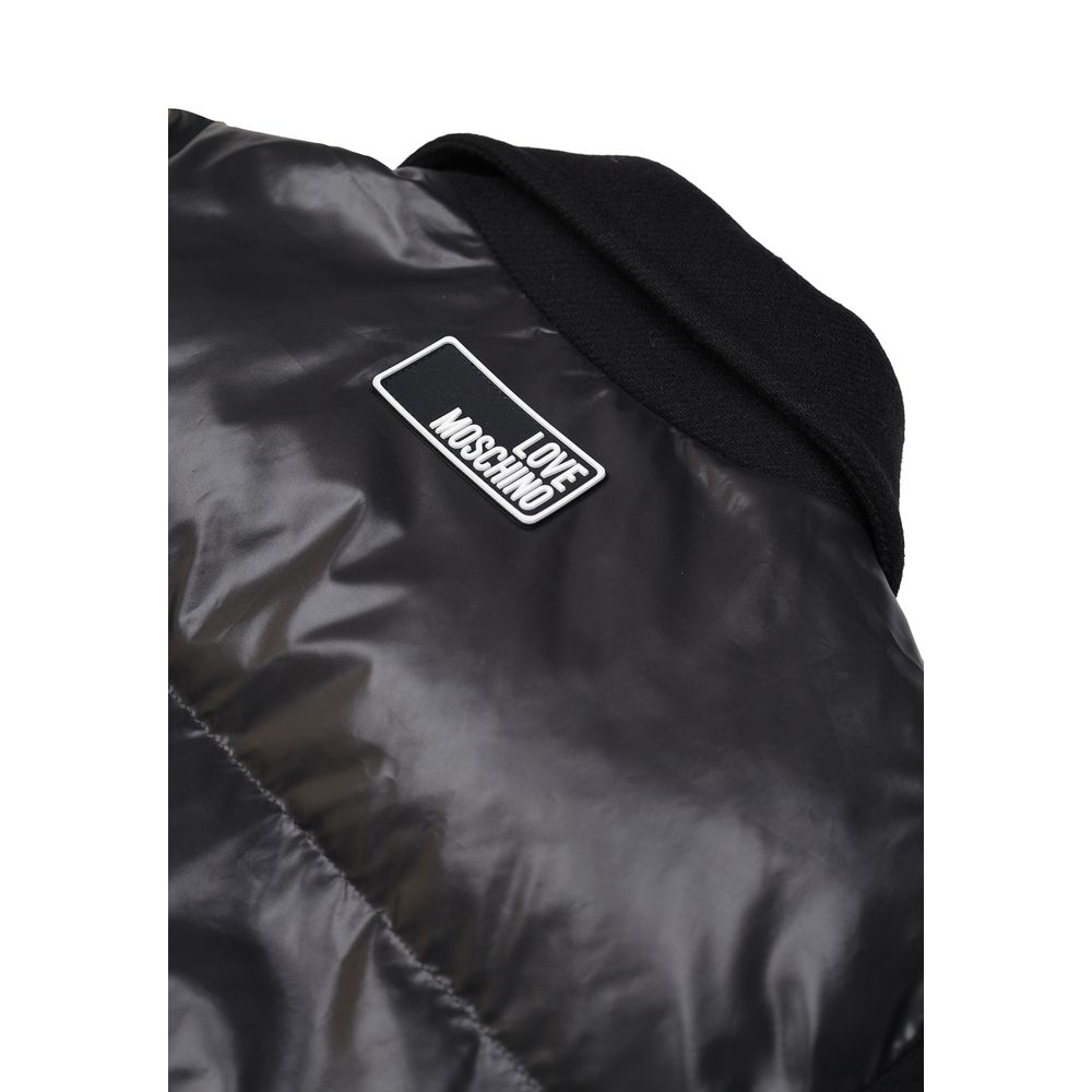 Windbreaker Jacket by Love Moschino for women in polyester black features an perennial silhouette with a refined and perennial insulated & windproof for a sophisticated weather-resistant look.