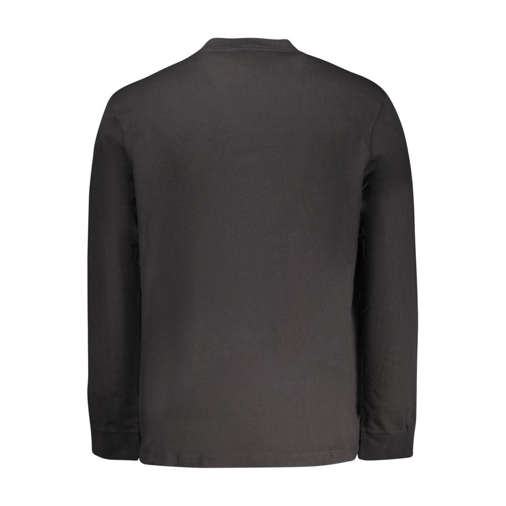 T-Shirt by Calvin Klein for men in cotton black & signature features an edgy silhouette, meticulously detailed with a sophisticated and for a truly edgy finish.