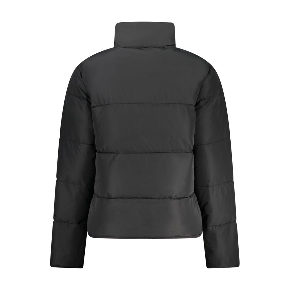 Windbreaker Jacket by Norway 1963 for women in polyamide black showcases a urban chic silhouette, detailed with a urban chic and functional pockets & windproof for a polished finish.