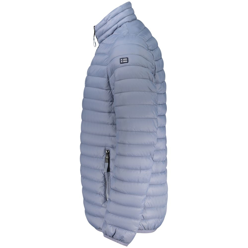 Overcoat by Norway 1963 for men in polyamide azzurro showcases a architectural silhouette, artfully detailed with a distinctive and functional lightweight & pockets for a architectural finish.