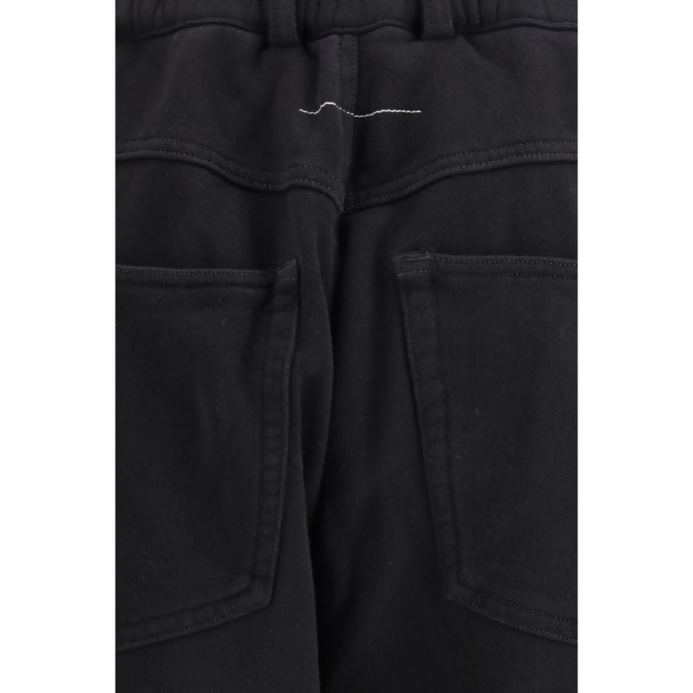 Track Pants by MM6 for women in cotton black & signature features an athletic athletic, relaxed-fit & regular-fit and long cut with a comfortable high rise, seamlessly detailed with functional breathable-design.