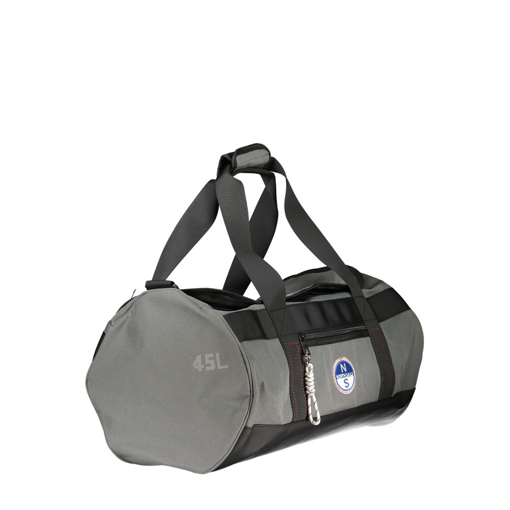 Small Flap Handbag by North Sails for unisex in cordura & coated canvas gray & print features a signature silhouette, showcasing a secure flap & zipper and signature external-pockets & internal-pockets with versatile shoulder-strap, handle & adjustable-strap for a sophisticated look.