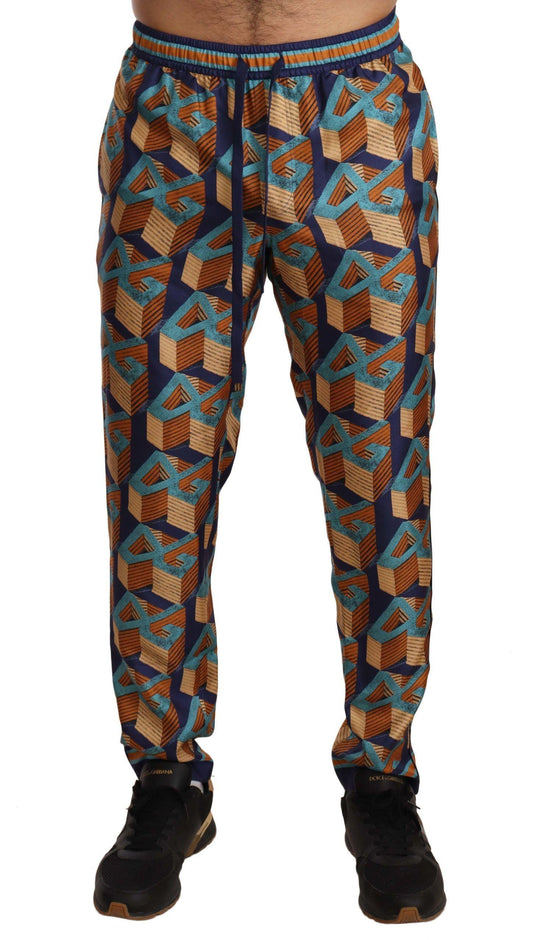 Multicolor Patterned Joggers Silk Pants designed by Dolce & Gabbana available from Moon Behind The Hill 's Clothing > Pants > Mens range