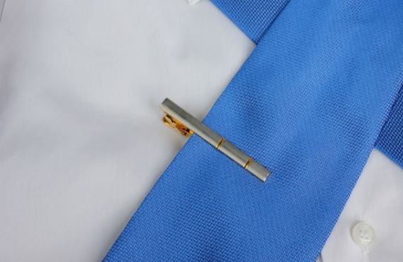 Men's designer tie clips and lapel pins available from Moon Behind the Hill