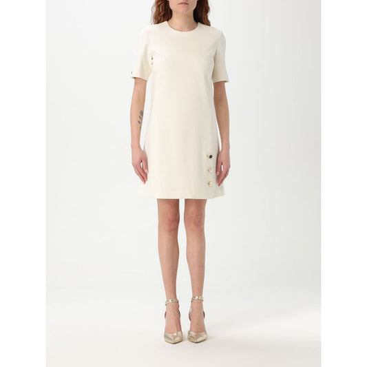 Dress by Twinset for women in polyester pearl showcases a striking silhouette, elegantly detailed with a short-sleeve, refined , and a striking short for a striking finish.