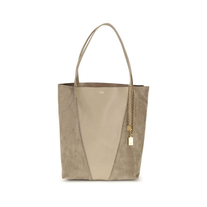 Evening Shoulder Bag by Chloé for women in grained & suede leather beige presents a statuesque silhouette, showcasing a secure and statuesque with versatile shoulder-strap & handle for a sophisticated look.