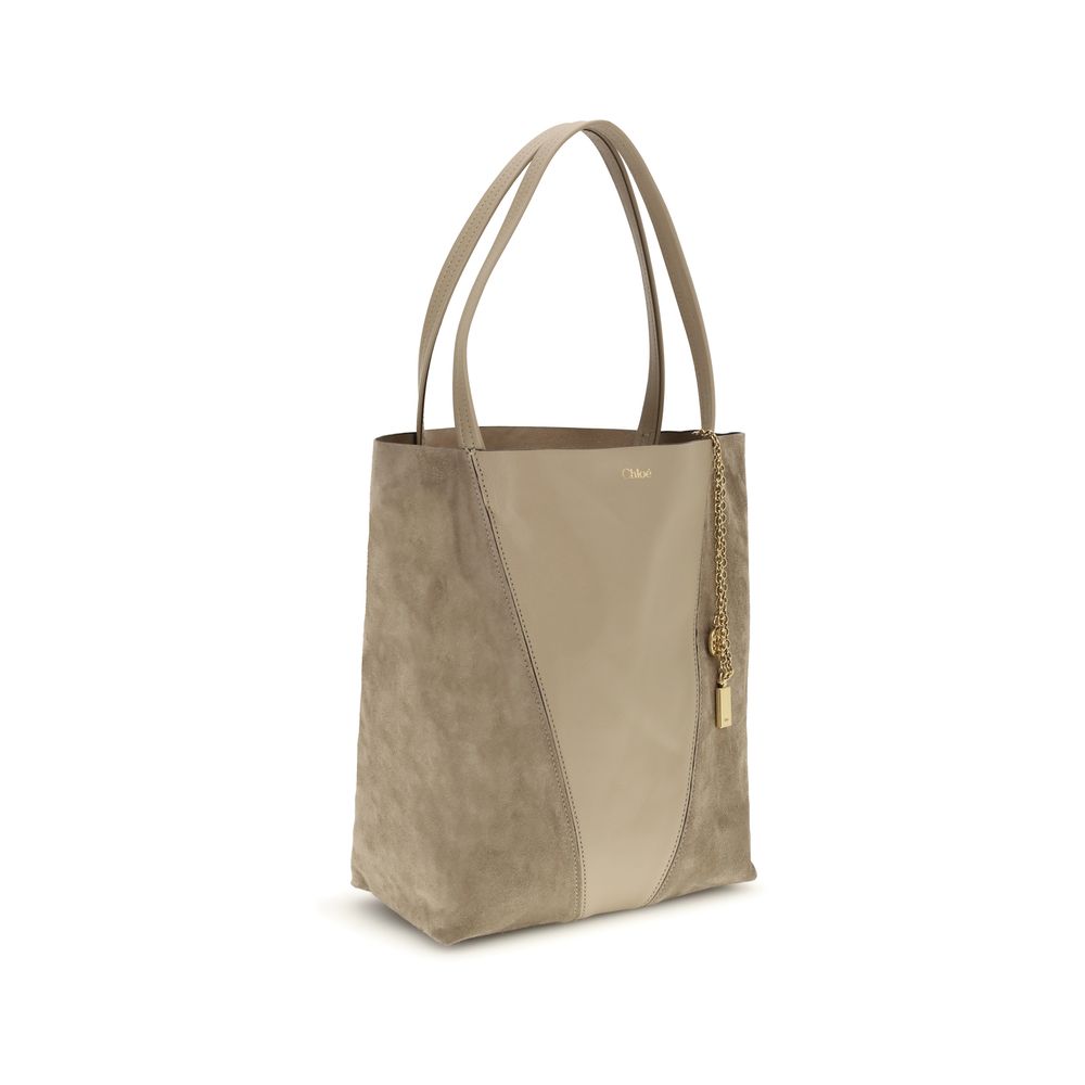 Evening Shoulder Bag by Chloé for women in grained & suede leather beige features a effortless chic silhouette with a secure , ample , and versatile shoulder-strap & handle for a effortless chic finish.