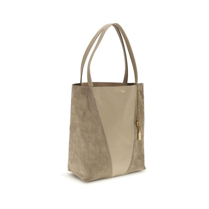 Evening Shoulder Bag by Chloé for women in grained & suede leather beige features a effortless chic silhouette with a secure , ample , and versatile shoulder-strap & handle for a effortless chic finish.