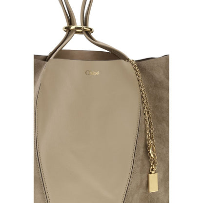 Evening Shoulder Bag by Chloé for women in grained & suede leather beige features a statuesque silhouette, showcasing a secure and statuesque with versatile shoulder-strap & handle for a statuesque finish.