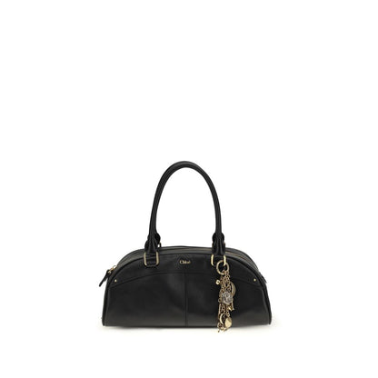 Large Shoulder Bowling Bag by Chloé for women in bos taurus calfskin leather black features a stately silhouette, showcasing a secure zipper, ample , and stately shoulder-strap & handle for a stately finish.