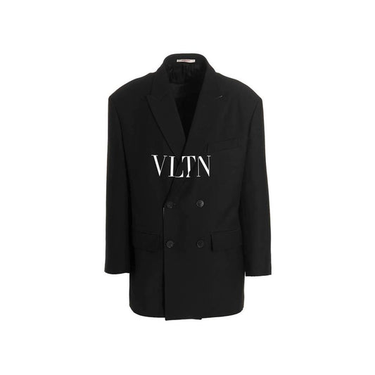 This Blazer by Valentino Garavani for men in virgin wool & silk black presents a tailored silhouette, meticulously tailored with a tailored and distinctive for a tailored finish.