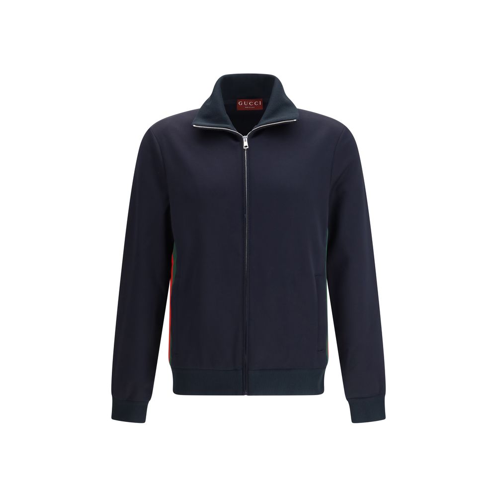 Windbreaker Jacket by Gucci for men in cotton polyester dark-blue features an perennial silhouette with a refined stand-collar neckline and perennial pockets & windproof for a sophisticated weather-resistant look.