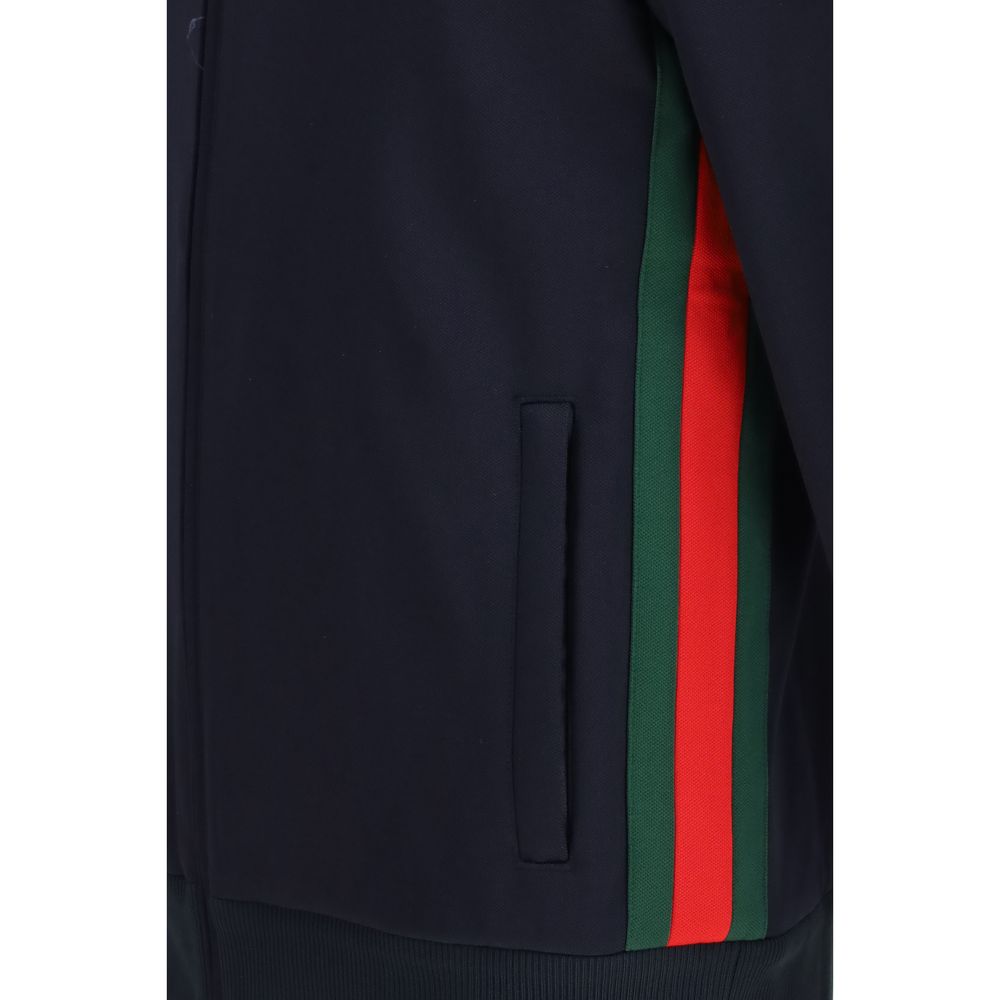 Windbreaker Jacket by Gucci for men in cotton polyester dark-blue showcases a modern silhouette, integrating pockets & windproof and a modern for a sophisticated finish.