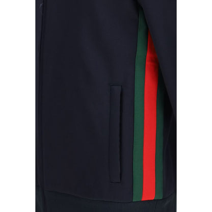 Windbreaker Jacket by Gucci for men in cotton polyester dark-blue showcases a modern silhouette, integrating pockets & windproof and a modern for a sophisticated finish.