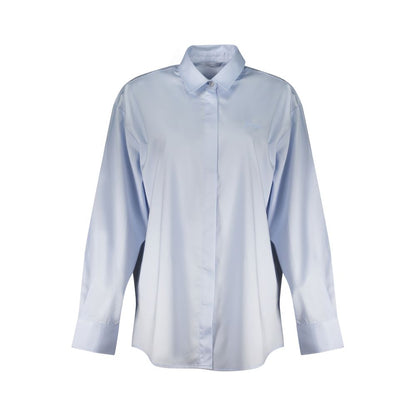 Dress Shirt by Guess Jeans for women in cotton blue presents a discerning silhouette, showcasing a sophisticated and long-sleeve for a truly discerning finish.