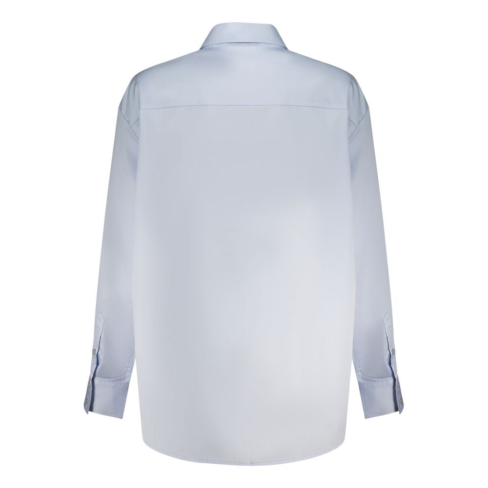 Dress Shirt by Guess Jeans for women in cotton blue presents a discerning silhouette, showcasing a sophisticated and for a truly discerning finish.