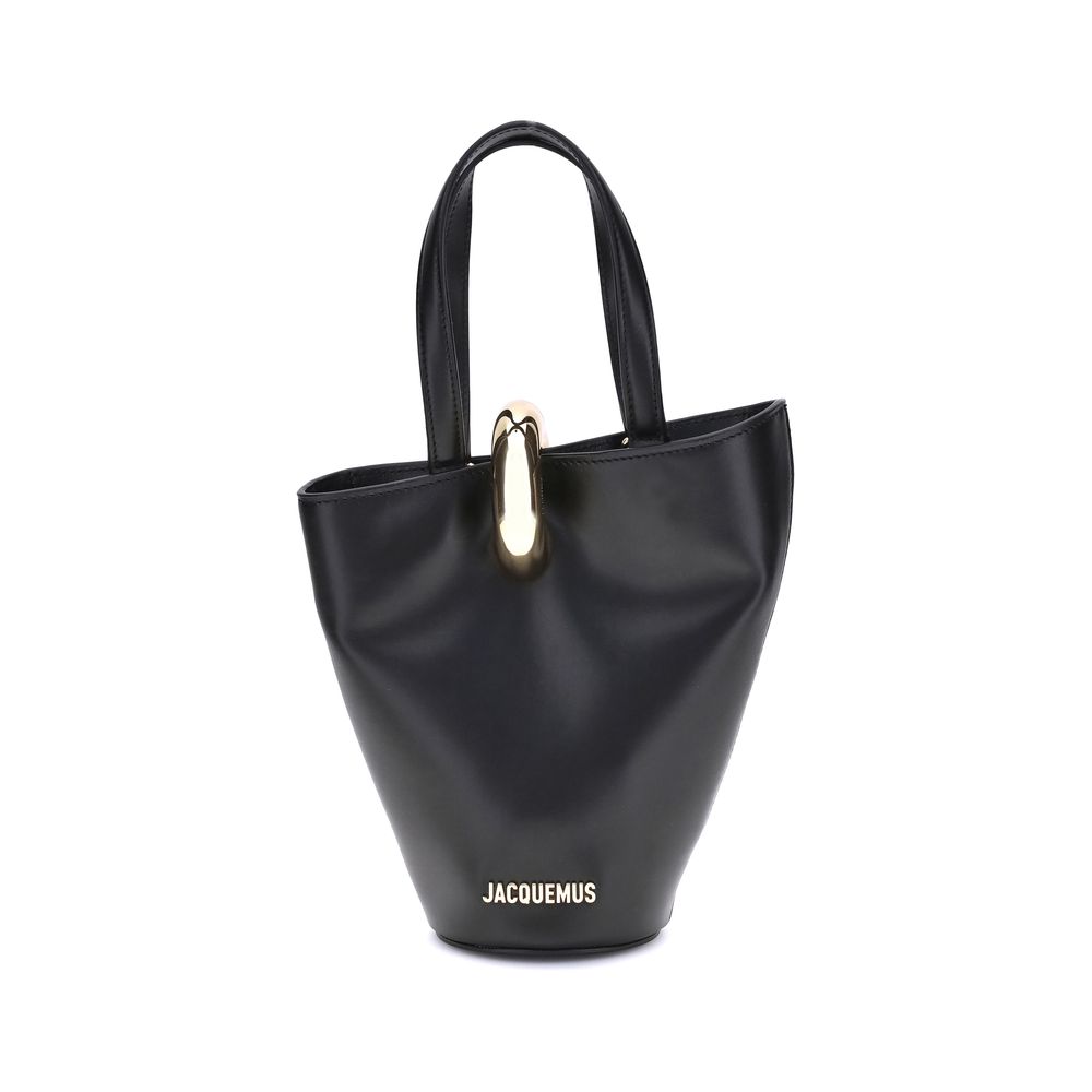 Small Shoulder Bucket Bag by Jacquemus for women in bos taurus calf leather black & gold presents a statuesque silhouette, showcasing a secure zipper and statuesque single-compartment with versatile shoulder-strap, handle & adjustable-strap for a sophisticated look.
