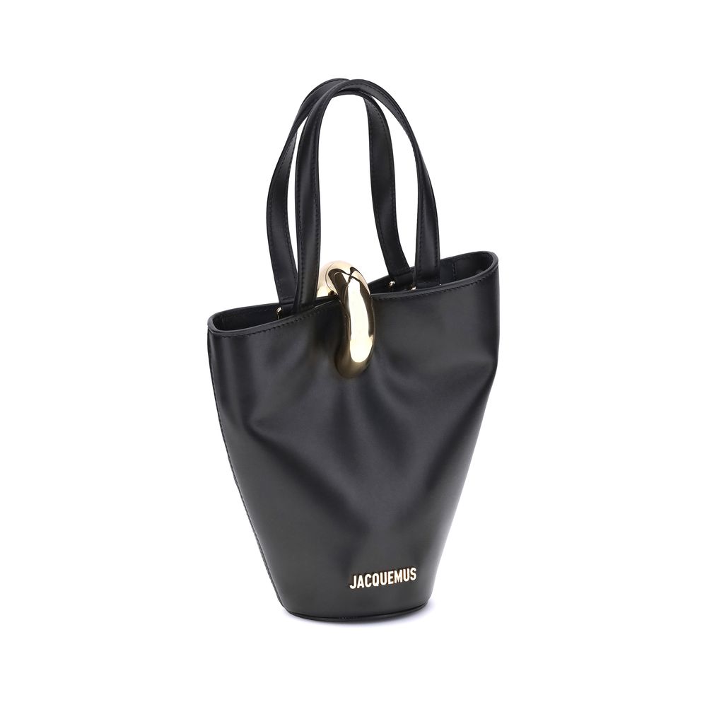 Small Shoulder Bucket Bag by Jacquemus for women in bos taurus calf leather black & gold features a effortless sophistication silhouette, secured by a zipper with ample single-compartment and versatile shoulder-strap, handle & adjustable-strap for a effortless sophistication finish.