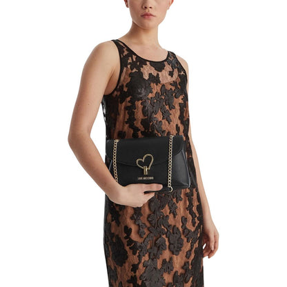 This Crossbody-Shoulder Handbag by Love Moschino for women in polyethylene & polurethane and black & gold presents a sculptural silhouette featuring a secure , ample , and versatile crossbody-strap, shoulder-strap & adjustable-strap for a sculptural finish.