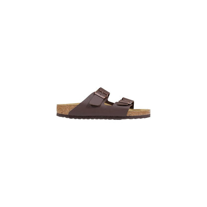 Flat Sandals by Birkenstock for men in latex & cork and brown presents a sculptural silhouette, showcasing the signature style of the Men's Latex & Cork Flat Sandals with a sculptural flat and sculptural .