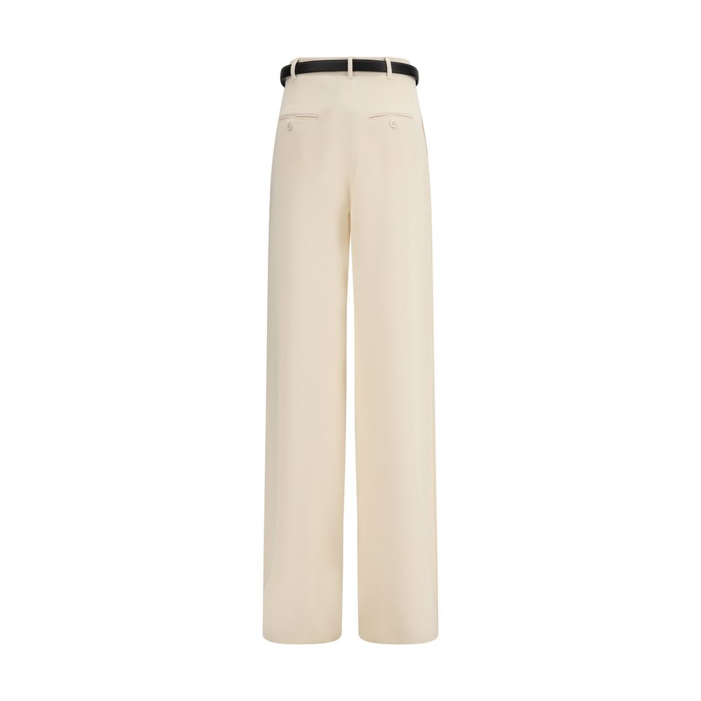 Trousers by Max Mara for women in polyester beige & ivory features an sartorial silhouette, showcasing a precise regular-fit & wide and long with a sartorial high rise for a refined look.