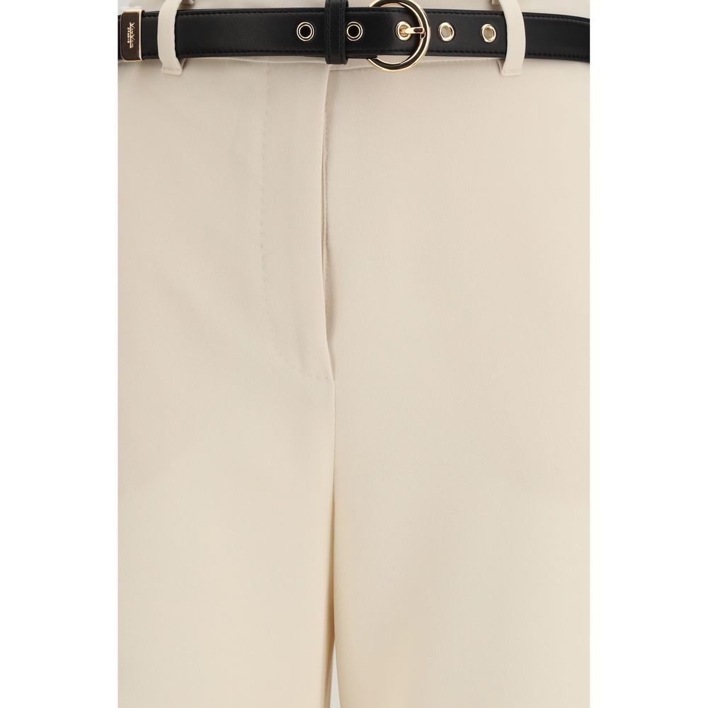 Trousers by Max Mara for women in polyester beige & ivory presents a perennial silhouette, meticulously tailored with a regular-fit & wide cut, long finish, and an elegant high rise.