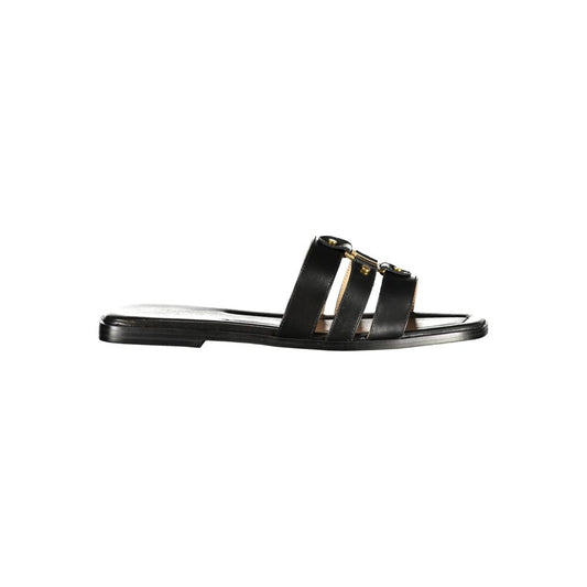 Flat Sandals by Twinset for women in polyurethane leather black features an statuesque silhouette from the Women's Polyurethane Leather Flat Sandals collection, showcasing a statuesque flat and elegant .