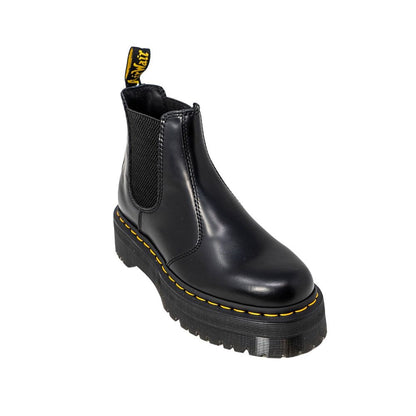 Ankle Winter Boots by Dr. Martens for women in leather black showcases a ergonomic silhouette from the Women's Leather Ankle Winter Boots collection, featuring a ergonomic and a ergonomic .