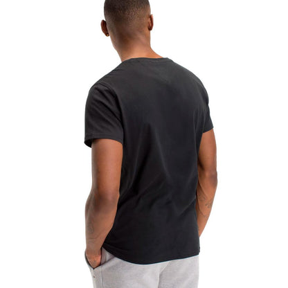 T-Shirt by Tommy Hilfiger Jeans for men in cotton black features an edgy silhouette, meticulously detailed with a sophisticated and v-neck neckline for a truly edgy finish.