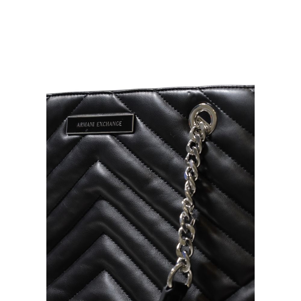 This Handbag by Armani Exchange for women in polyester faux leather and black presents a sculptural silhouette featuring a secure , ample , and versatile handle for a sculptural finish.