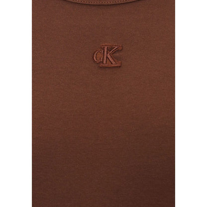 Dress by Calvin Klein Jeans for women in stretch cotton & silicone brown features an sultry silhouette defined by a and , falling to an sultry long for a sultry look.