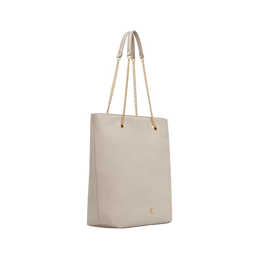Tote Handbag by Calvin Klein for women in polyethylene & polyurethane beige & gold presents a ornamental silhouette, showcasing a secure drawstring, ample , and versatile handle for a ornamental finish.