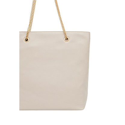 Tote Handbag by Calvin Klein for women in polyethylene & polyurethane beige & gold features a exquisite silhouette, showcasing a secure drawstring and exquisite with versatile handle for a exquisite finish.