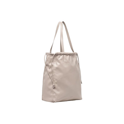 Tote Handbag by Calvin Klein for women in polyethylene & polyurethane beige features an refined silhouette, showcasing a secure drawstring, ample , and versatile handle for a sophisticated refined aesthetic.