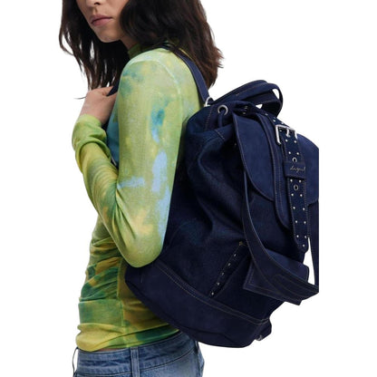 Small Travel Flap Backpack by Desigual for women in poly cotton blue & signature features a architectural Poly Cotton Small Travel Flap Backpack design with a secure snap, flap, buckle & button, ample external-pockets, and versatile backpack-strap & adjustable-strap for a architectural finish.
