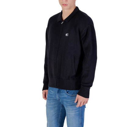 Cardigan by Tommy Hilfiger Jeans for men in cotton black presents a textural silhouette, artfully finished with a textural and for a sophisticated, textural look.