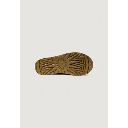 Ankle Boots by UGG for women in leather & rubber beige features an aerodynamic silhouette from the Women's Leather & Rubber Ankle Boots collection, showcasing a aerodynamic and refined for an aerodynamic look.