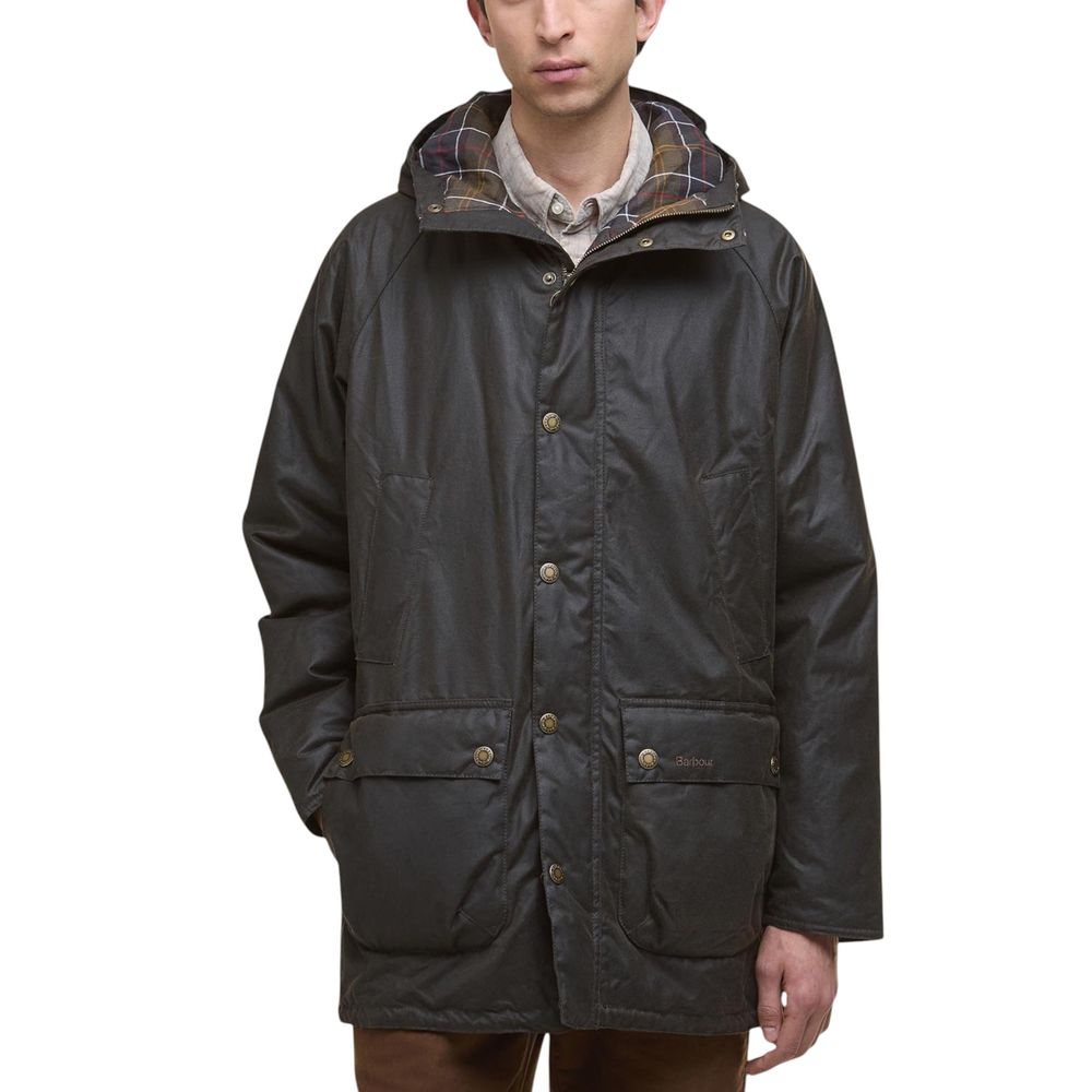 This Hooded Parka by Barbour for men in cotton & metal green presents a utilitarian silhouette, meticulously detailed with pockets & hooded and a utilitarian hooded neckline for a sophisticated, weather-ready look.