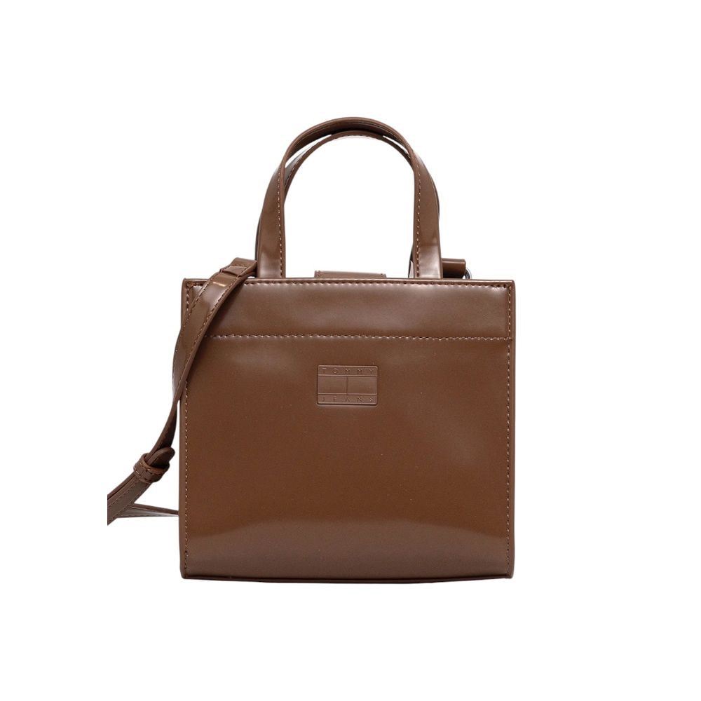 Crossbody-Shoulder-Tote Handbag by Tommy Hilfiger Jeans for women in polyethylene & polyurethane beige presents a ornamental silhouette, showcasing a secure , ample , and versatile crossbody-strap, shoulder-strap, adjustable-strap & handle for a ornamental finish.