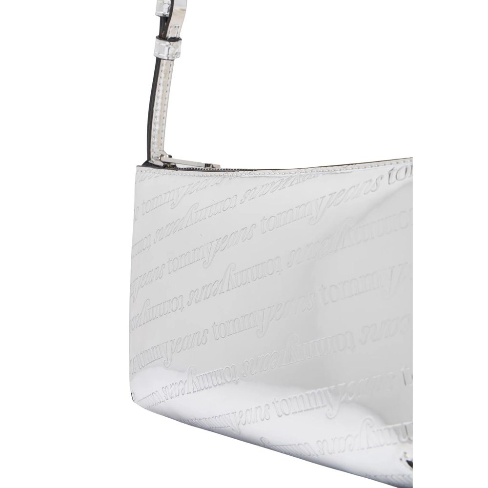 Shoulder Handbag by Tommy Hilfiger Jeans for women in polyethylene & polyurethane silver features an refined silhouette, showcasing a secure zipper, ample , and versatile shoulder-strap & adjustable-strap for a sophisticated refined aesthetic.