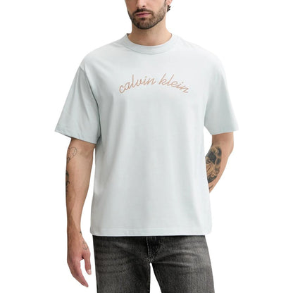 T-Shirt by Calvin Klein Jeans for men in cotton blue features an on trend silhouette, perfectly showcasing a on trend short-sleeve and for an elevated aesthetic.
