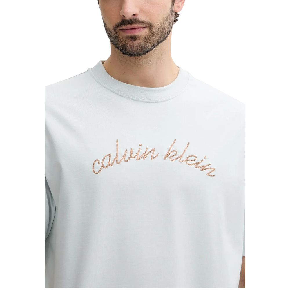 T-Shirt by Calvin Klein Jeans for men in cotton blue showcases a fashionable silhouette, elegantly detailed with a fashionable and for a sophisticated, high-fashion look.