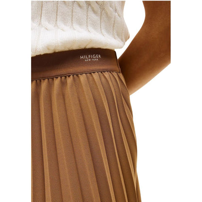 Skirt by Tommy Hilfiger for women in polyester brown features an tailored silhouette, artfully capturing the essence of Women's Midi Lightweight Pleated Polyester Skirt in a sophisticated midi.