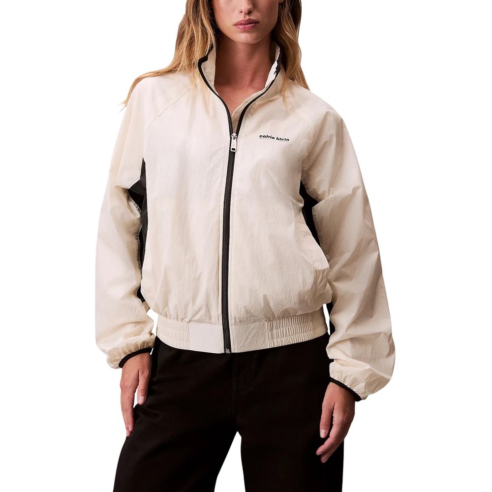 Windbreaker Jacket by Calvin Klein Jeans for women in polypropylene white features an magnificent silhouette, showcasing the sophisticated high-collar neckline and functional lightweight & windproof for a premium, magnificent look.