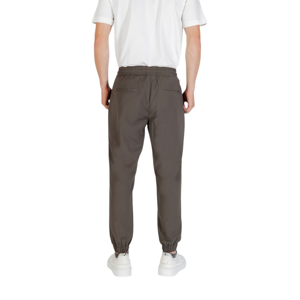 Trousers by Antony Morato for men in stretch polyester & viscose green features a sculptural silhouette, showcasing a sculptural regular-fit and long with a sophisticated for a sculptural finish.