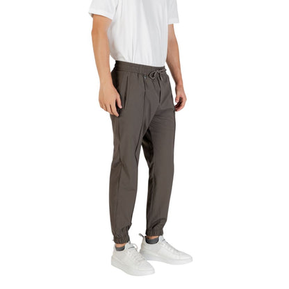 Trousers by Antony Morato for men in stretch polyester & viscose green features a tailored silhouette with a tailored regular-fit, defined by its long and a sophisticated .