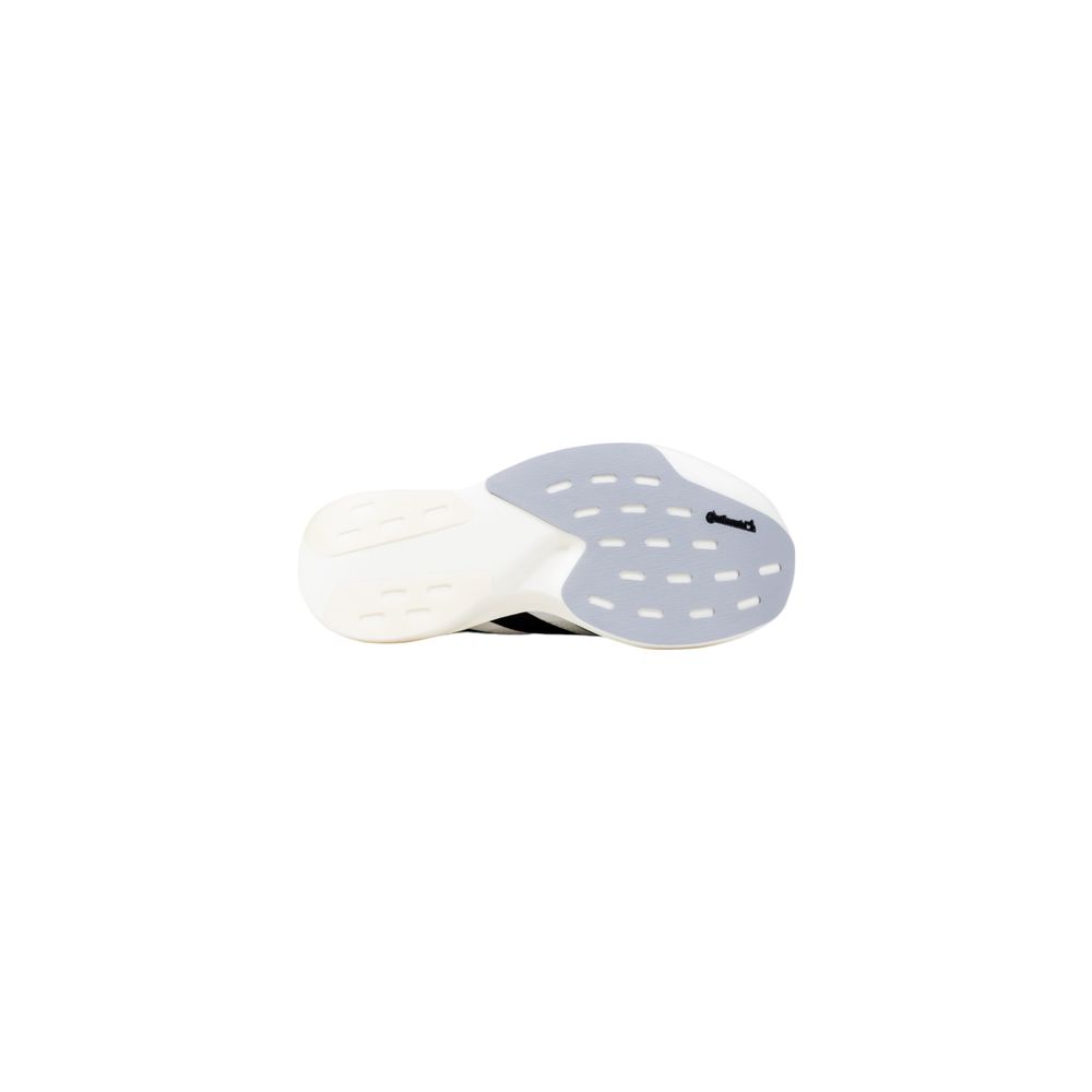Sneakers by Adidas Originals for men in silicone black & white features a sumptuous design, perfectly showcasing the sumptuous athletic style of this Men's Lightweight Athletic Silicone Sneakers.
