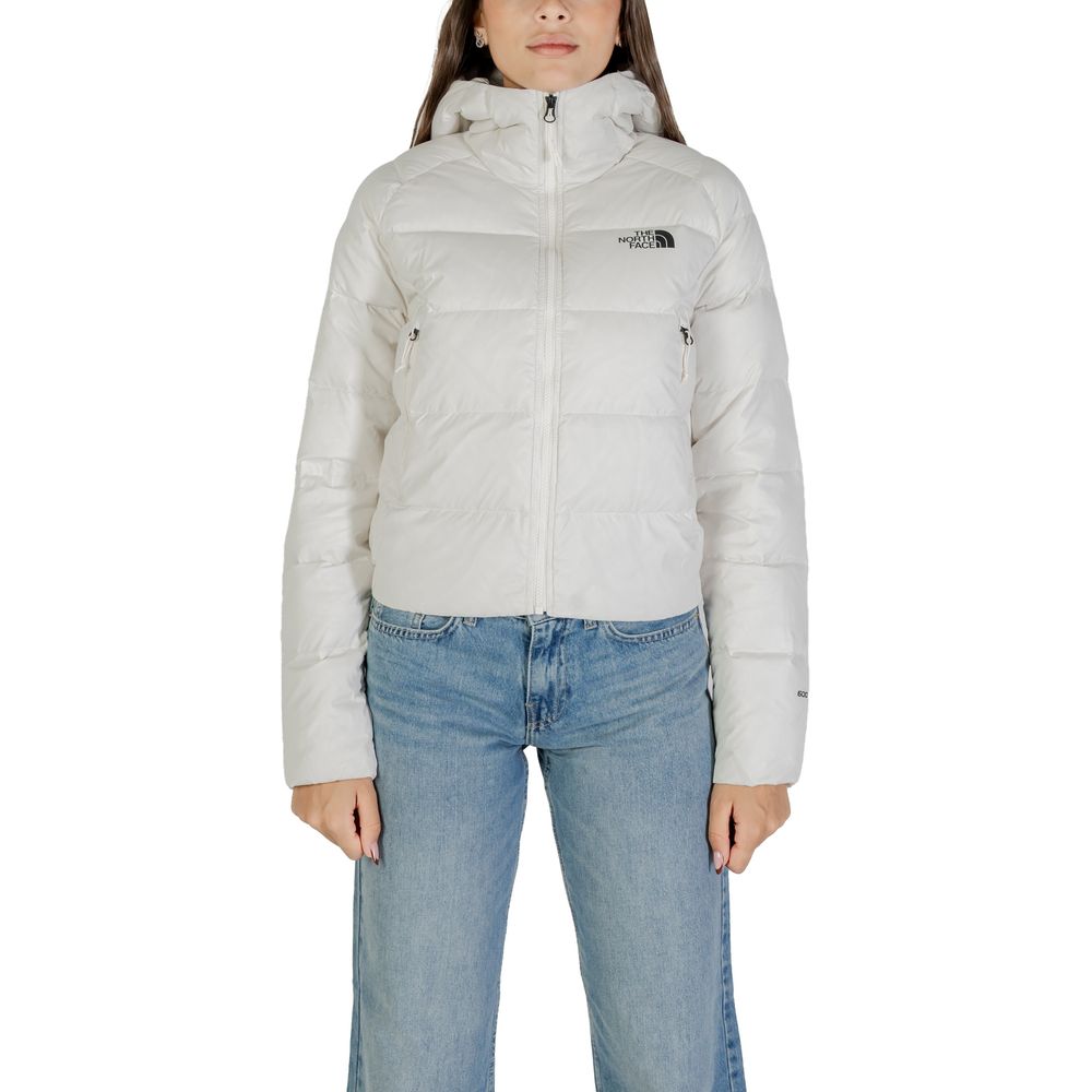 Hooded Overcoat by The North Face for women in nylon cream features a cosy chic silhouette, artfully detailed with a sophisticated hooded neckline and premium thermal, pockets, hooded & insulated for a cosy chic finish.